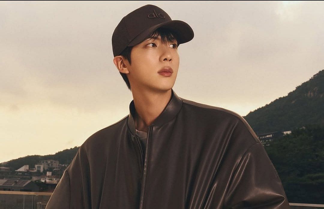 Featuring Jin in Alo Yoga (Image via @alo/Instagram)